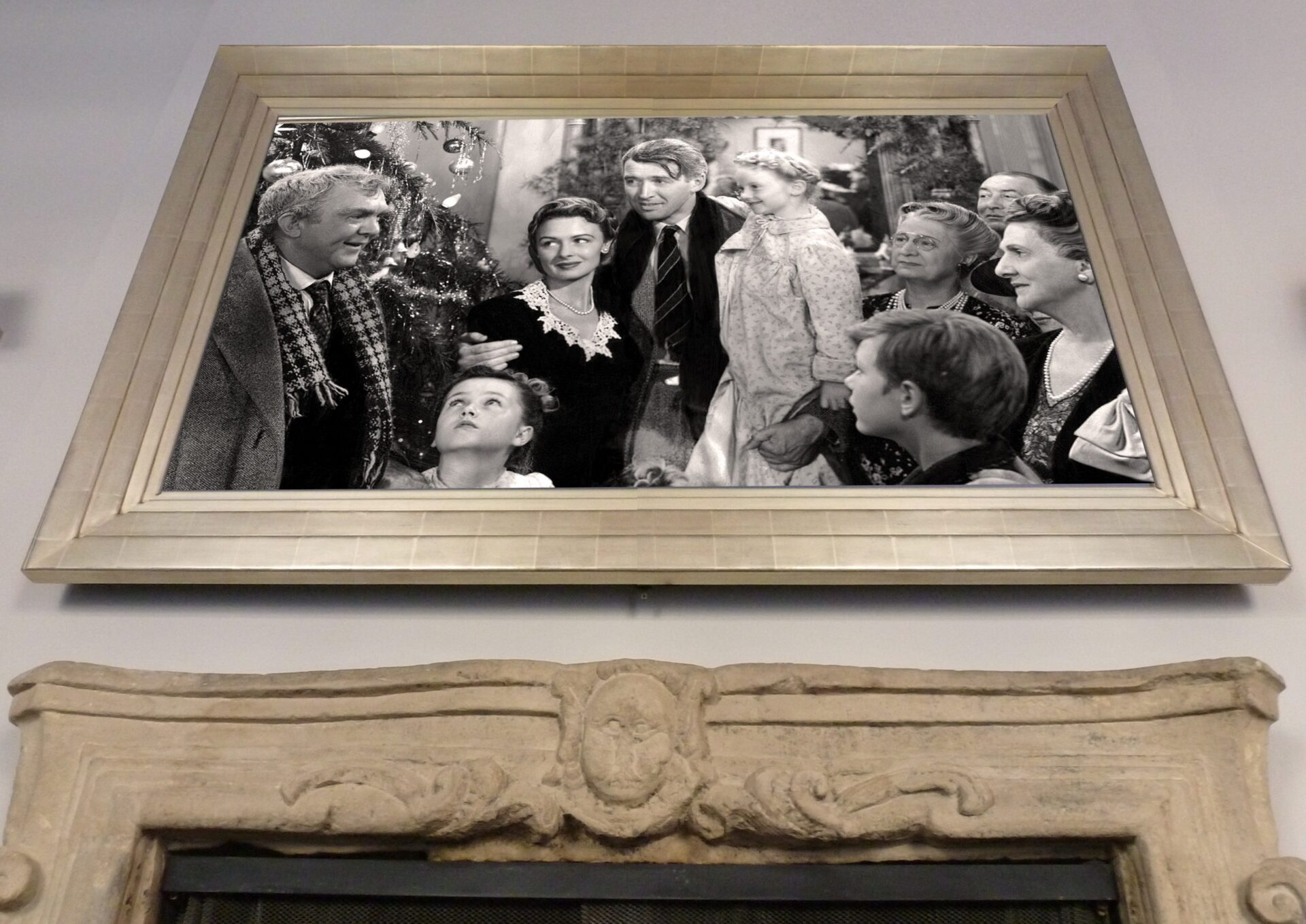 gold reflectel mirror tv over stone mantle