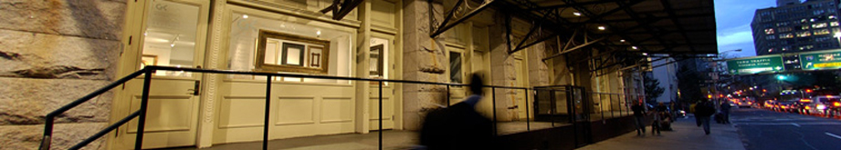 photo showing the reflectel storefront at night