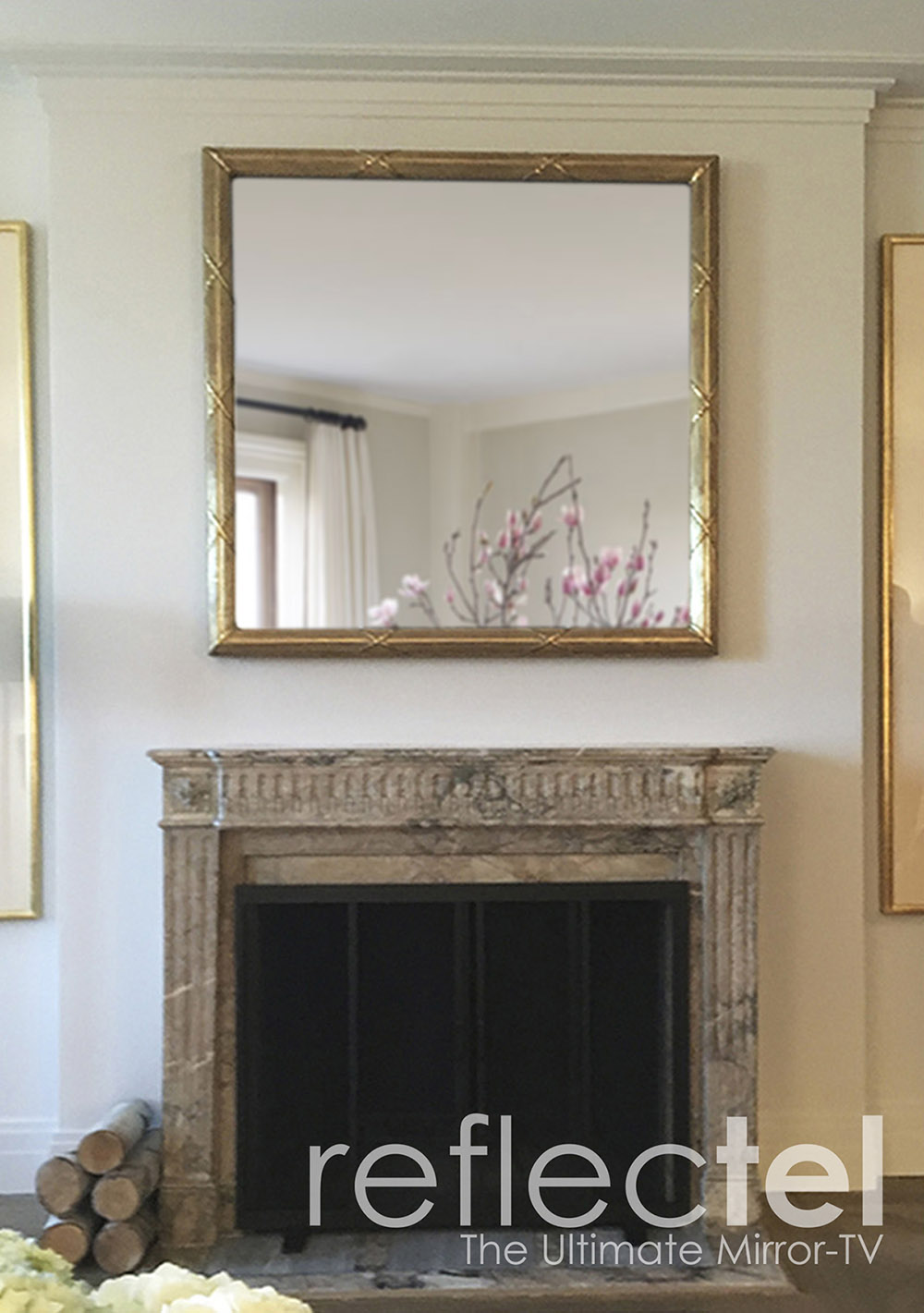 Portfolio gold reflectel mirror tv hangs over antique marble mantle in nyc apartment