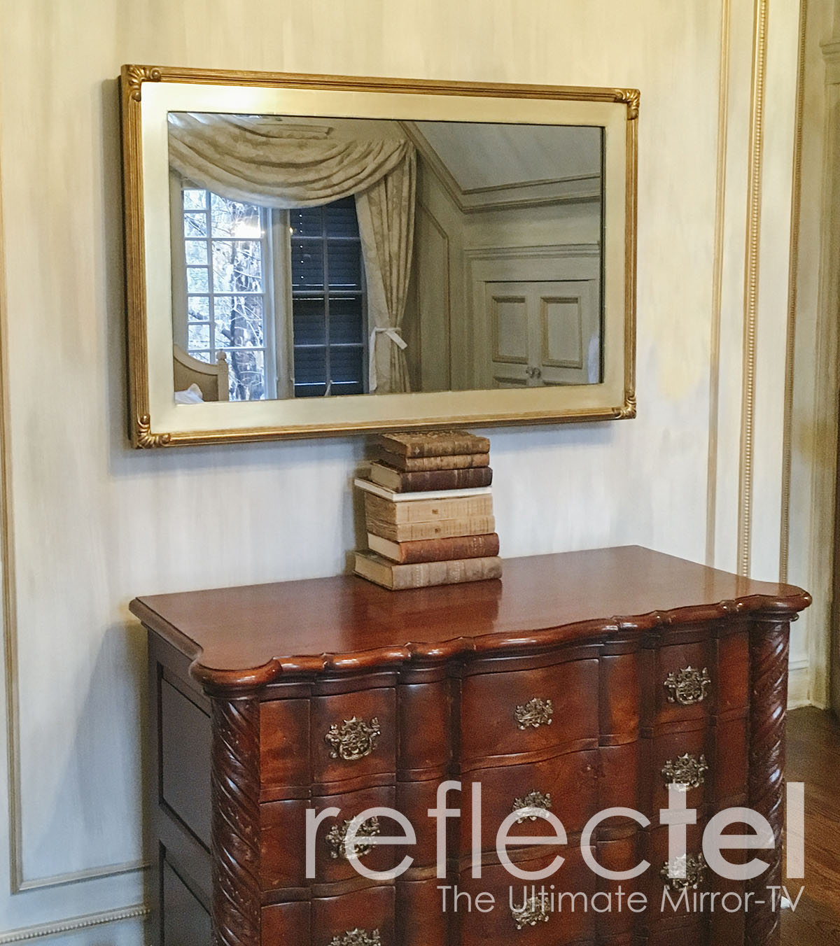 Gold Reflectel Portfolio Mirror Tv Hangs Over Antique Dresser In New York City Apartment
