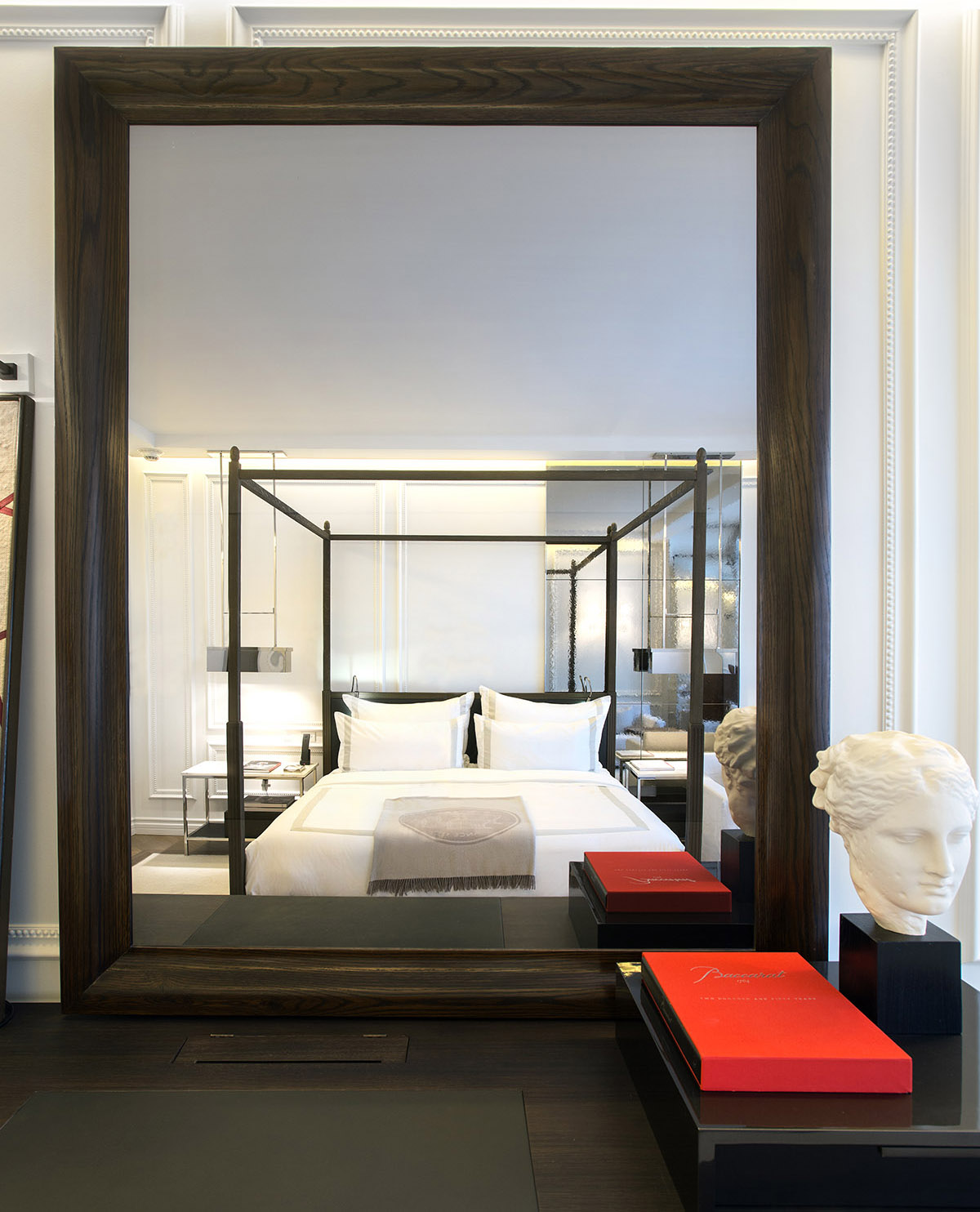 Baccarat Hotel Bedroom with Mirror TV in custom mahogany wooden frame