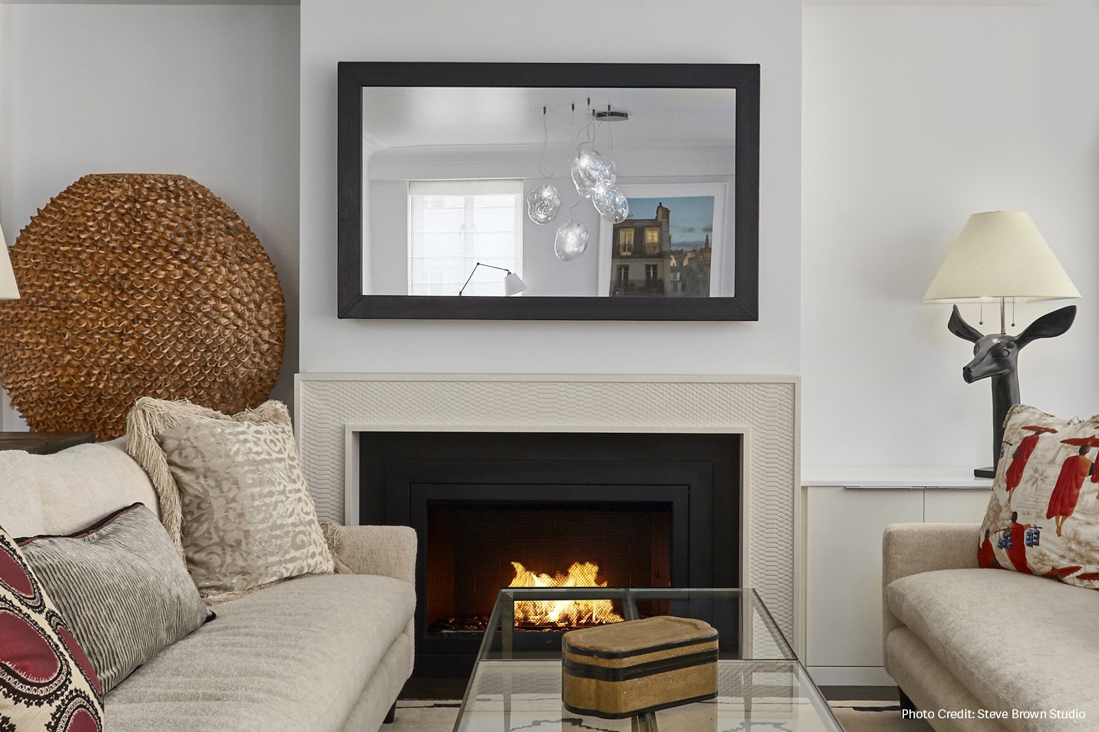NYC Living Room Interior With A 55 Inch Mirror Tv Over Fireplace Mantel