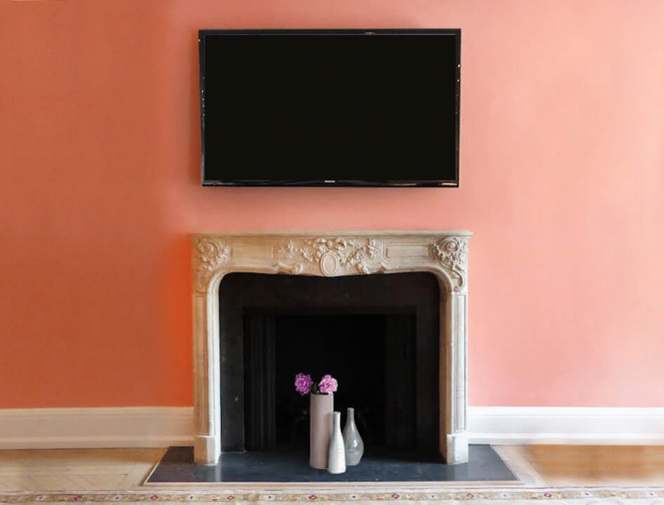 carved wood mirror tv landscape over fireplace mantel in living room
