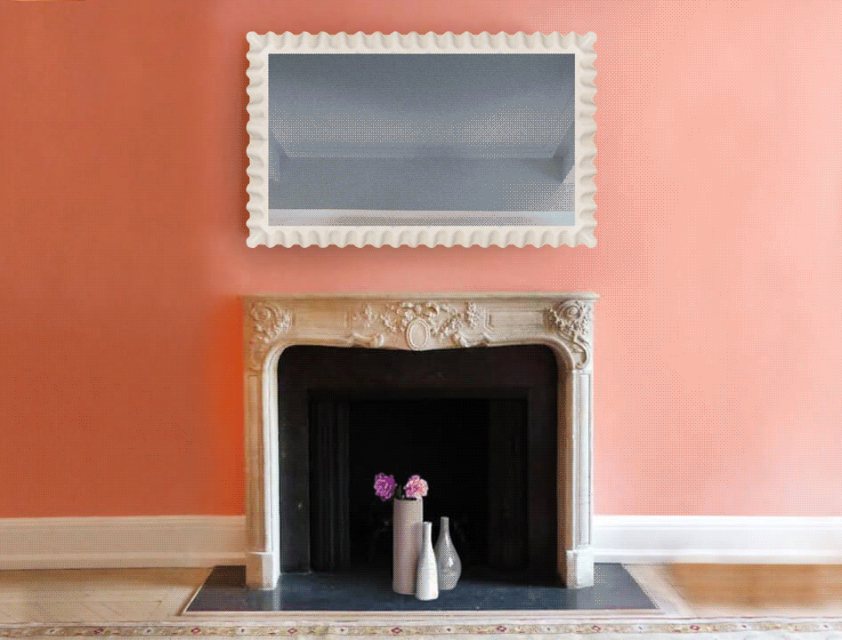 mirror television with white cream wood carved frame over mantel fireplace