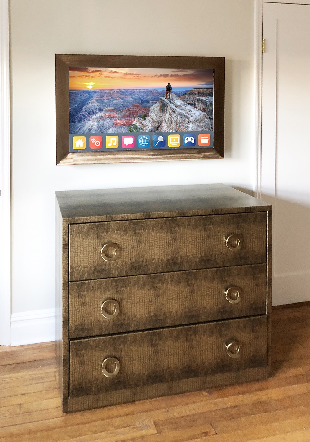 43 Inch Mirror Television With Bronze Metal Frame Over Dresser In Bedroom