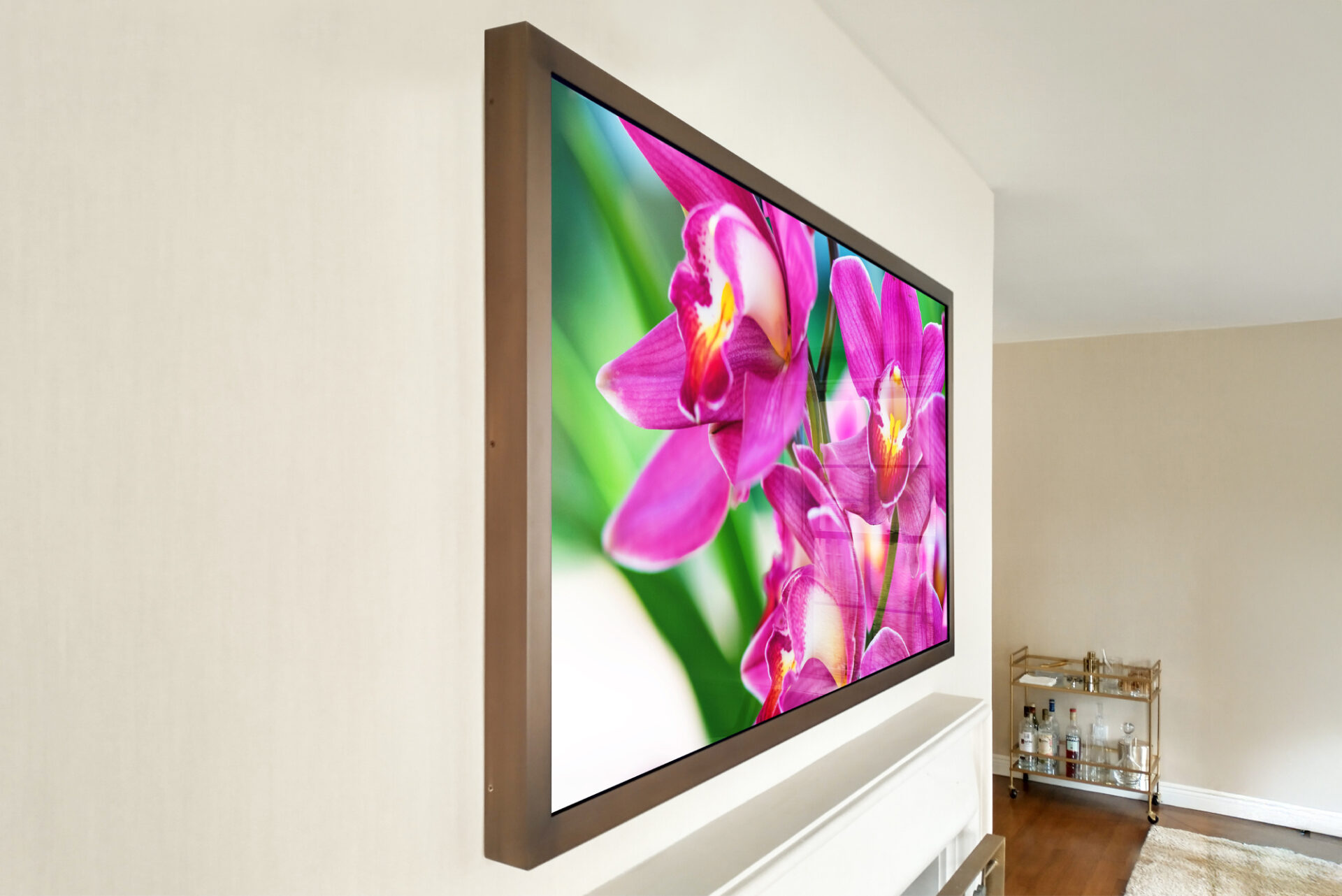 Side Angle Of A TV Frame With Bronze Metal Turned On With Flowers