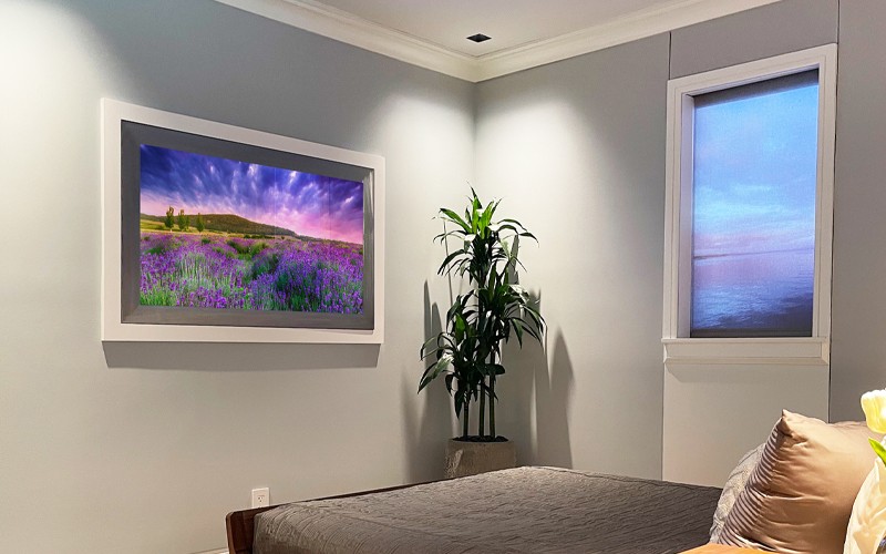 Mirror TV With A Metal Frame In A Bedroom Setting