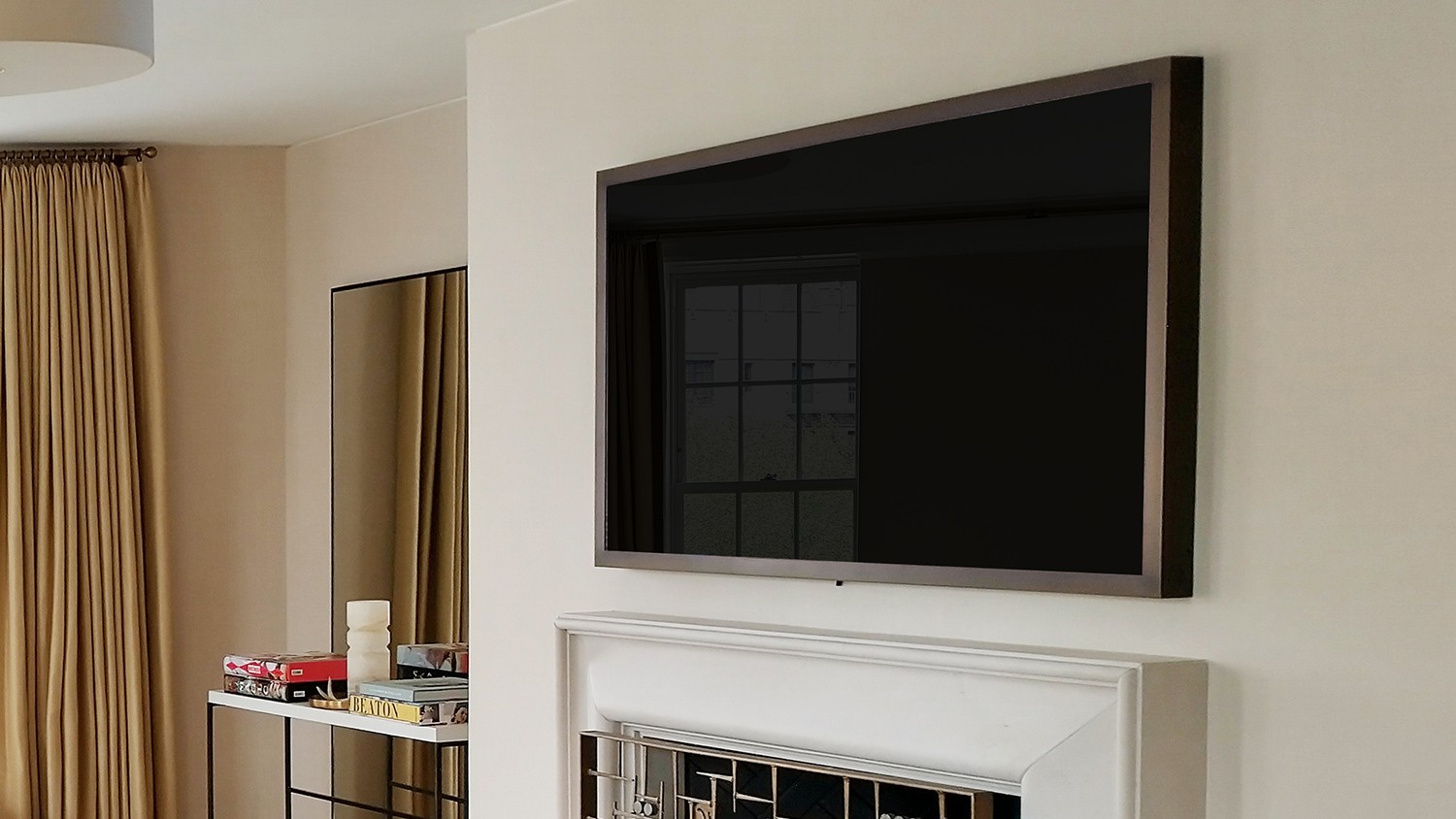 Bronze Metal Framed TV Over Mantel