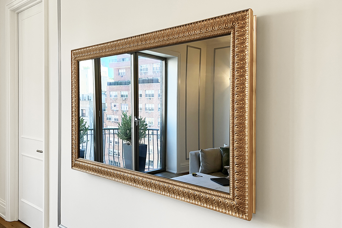 TV Mirror With Gold Peacock Feather Carved Frame In Living Room