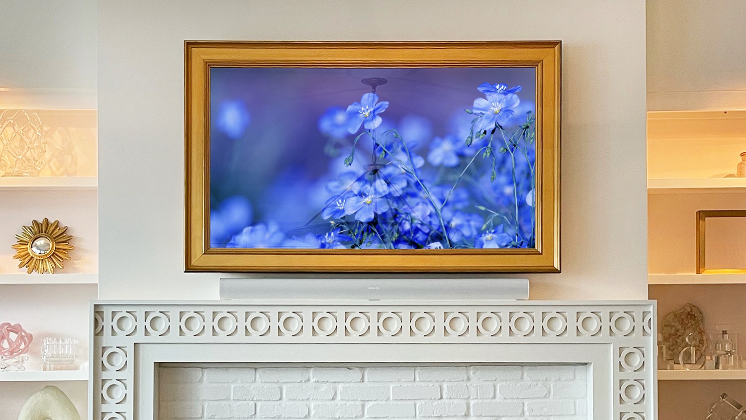 TV Mirror over fireplace and a gold frame