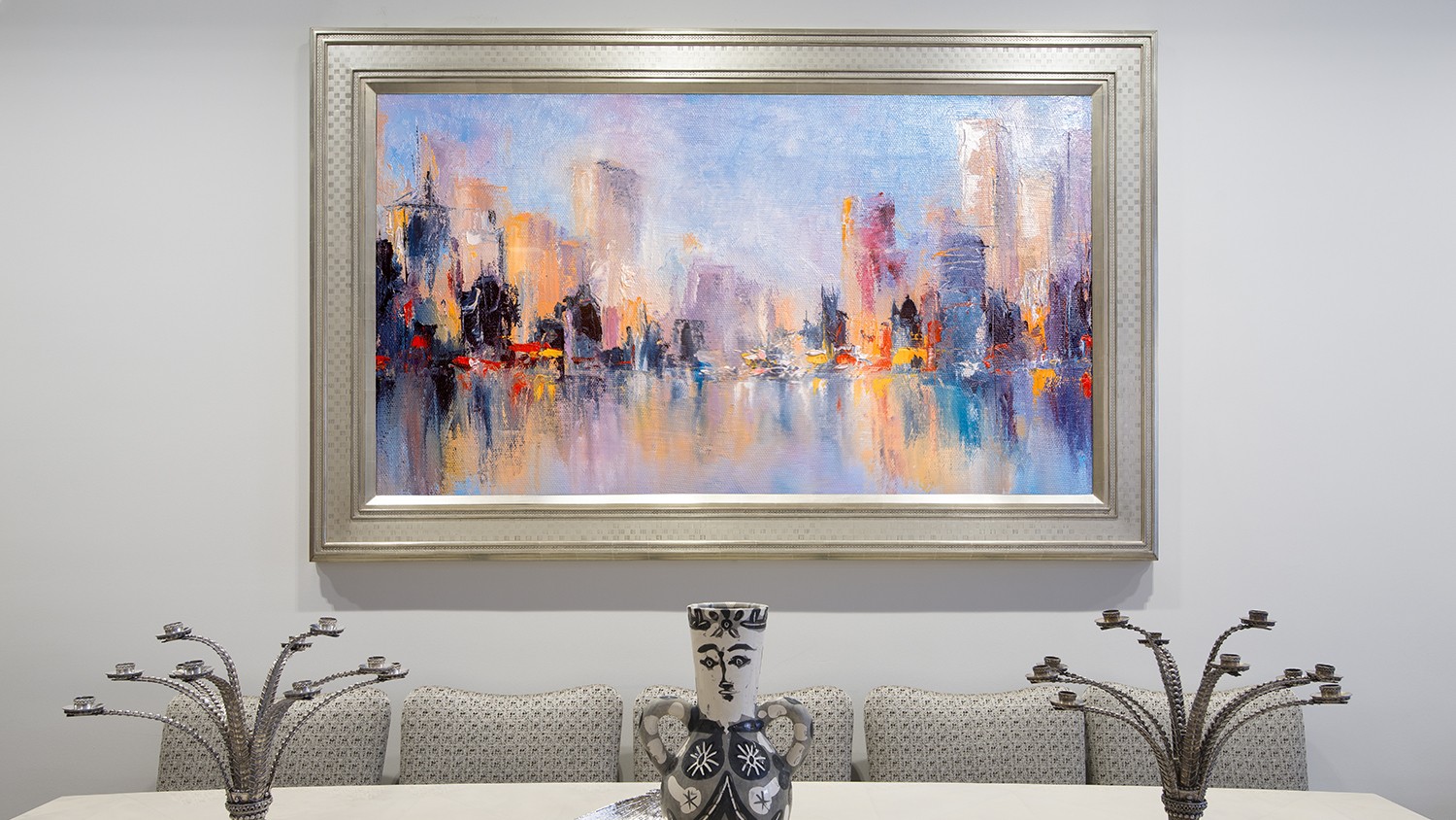 Mirrored Television With Silver Frame And NYC Skyline Painting