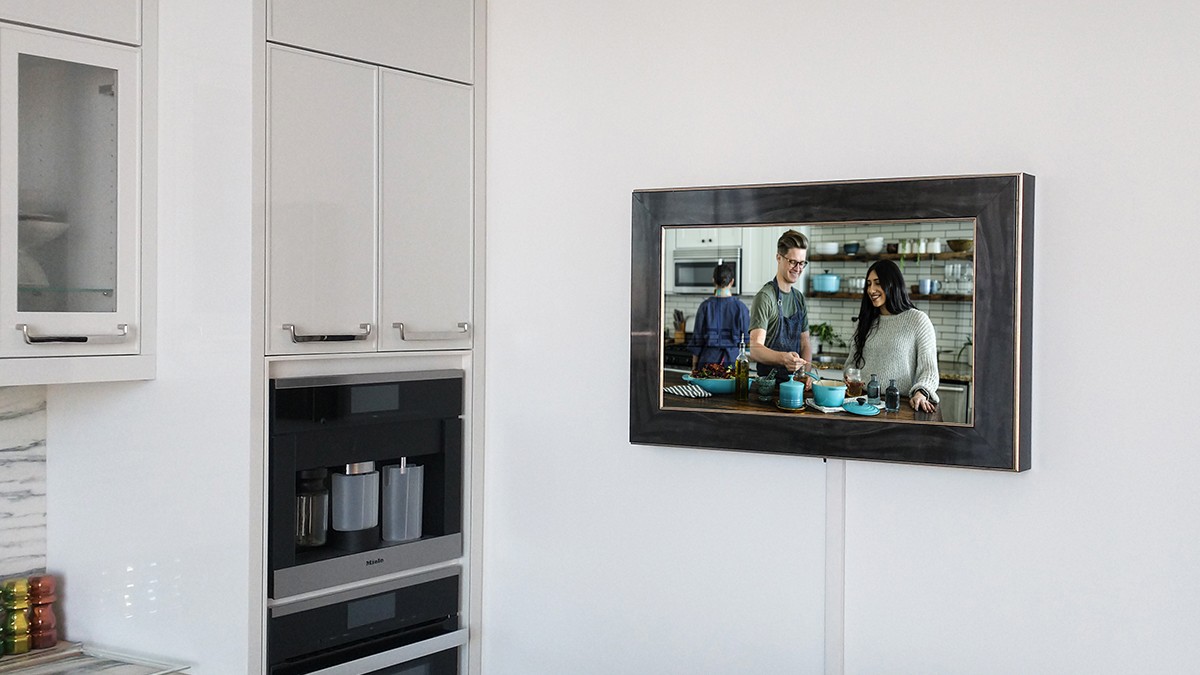 Holiday House NYC TV Mirror Installed In Kitchen With Black Frame