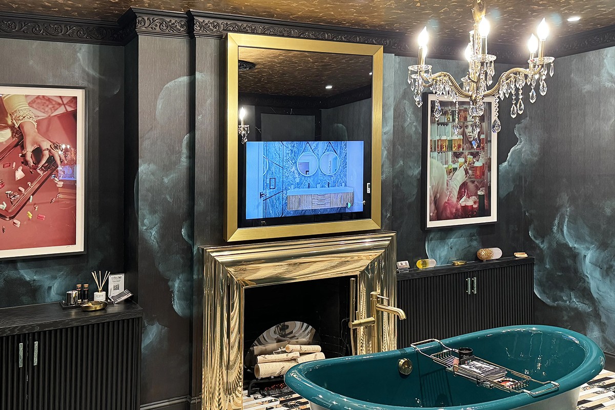 Portrait TV Mirror With Gold Signature Shaped Frame Over Fireplace In Kips Bay