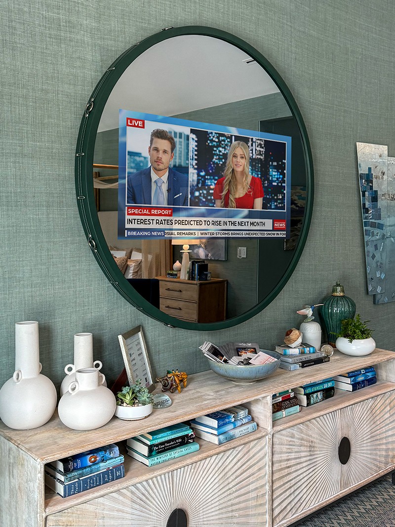 Circle TV Mirror With A Green Leather Frame In Bedroom