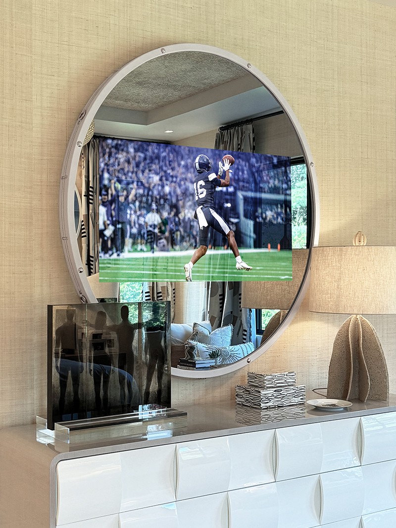 White Leather Circle TV Mirror Installed In Holiday House Hamptons Bedroom