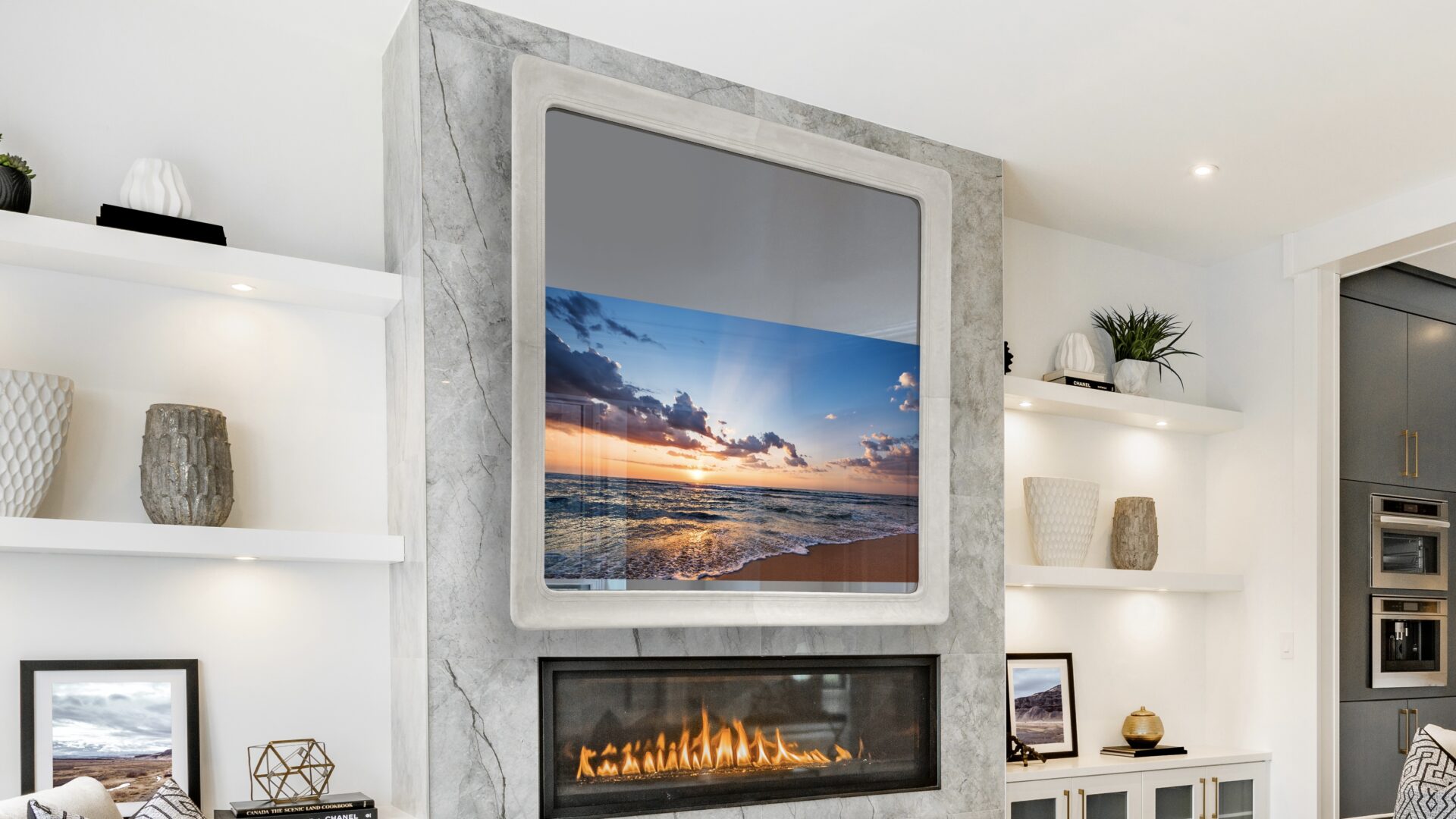 contemporary living room with open concept view through to dining room kitchen and a marble fireplace with gas fire