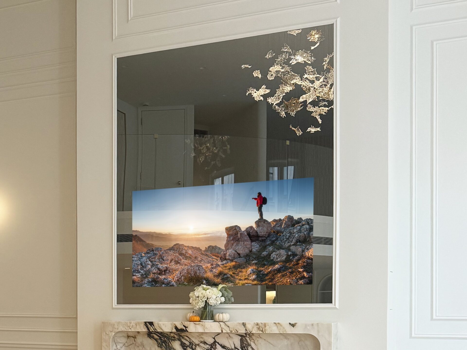 hidden TV mirror recessed into millwork in living room above mantel