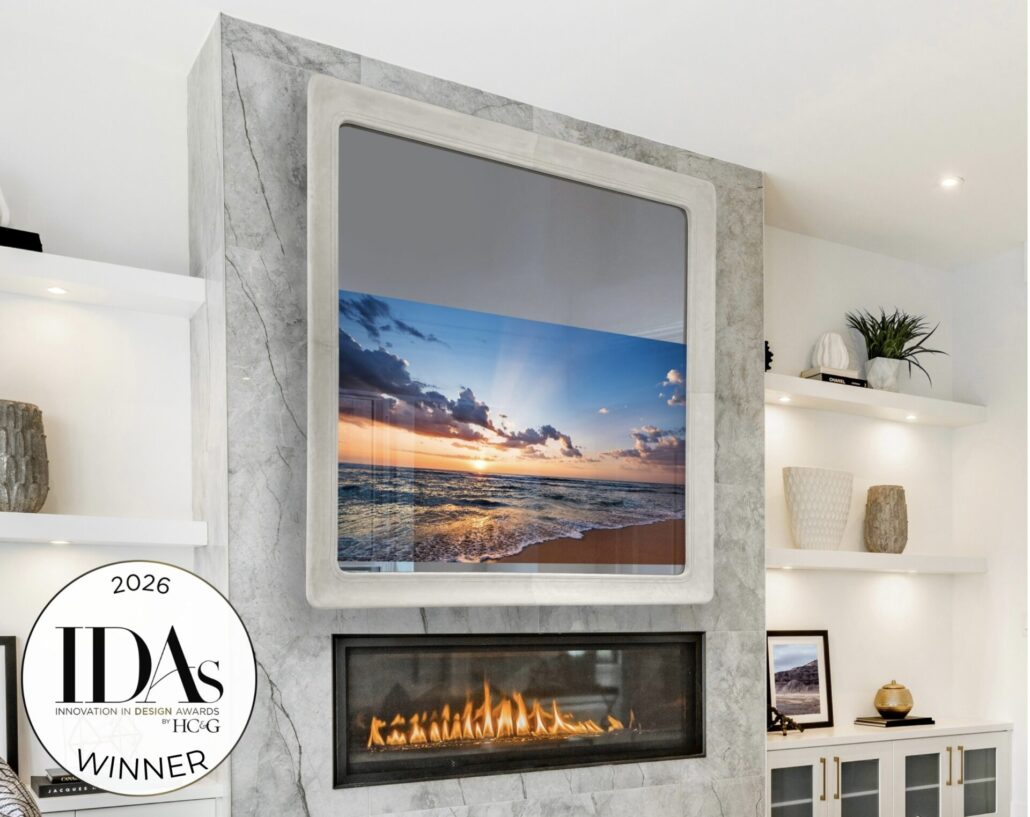 gray leather framed tv mirror in swoop tv frame profile with award badge for cottages and gardens innovation in design awards winner