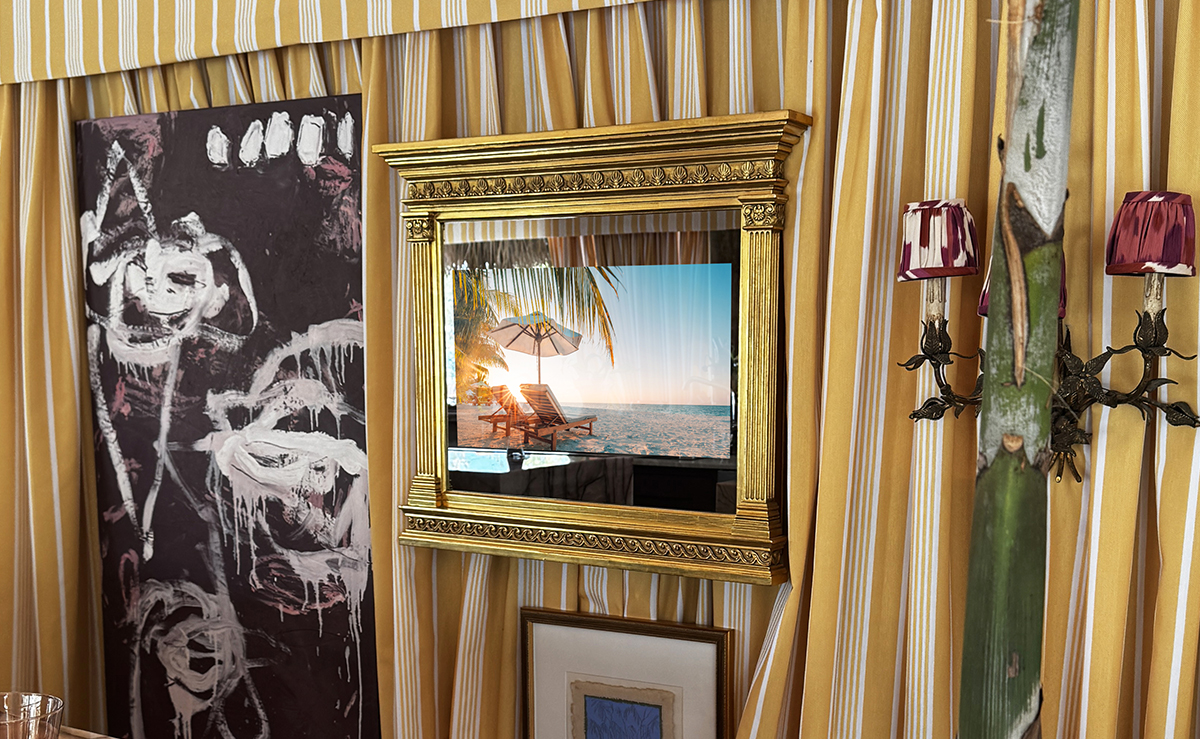 Vintage Gilded Gold Tabernacle Framed Mirror Tv In Tiki Hit With Yellow Striped Wall Coverings