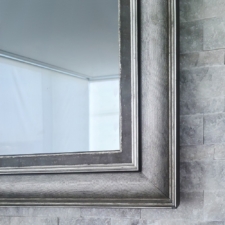 Signature Carved - SS20-S prefinished framing on television mirror on stone grey wall over fireplace