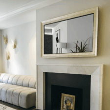 55" Landscape - Gilded Carved Upper East Side NYC white hand laid gilded framed tv hidden behind water white glass