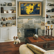 55" Landscape - Gilded Shaped Western Long Island Family Great Room television 55 inch with yellow gold frame in classic living room stone fireplace mantel