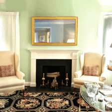 55" Landscape - Gilded Shaped Best bespoke yellow gilded landscape edge to edge mirror television over mantel green walls in Arlington Virginia