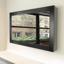 43" Landscape - Metal 43 inch tv hidden behind best dielectric water white glass sleek metal frame and painted white buildup by Farrow and Ball