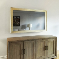 65" Landscape - Gilded Shaped elegant white gold framing with ambient mirror in living room