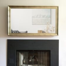 55" Landscape - Signature Shaped* signature silver framing with water white mirror black modern fireplace