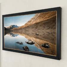 83" Landscape - Signature Flats black prefinished mirror television edge to edge in living room white wall