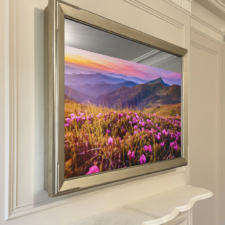 55" Landscape Plus - Gilded Shaped - with integrated soundbar gilded silver tv mirror over a traditional fireplace white marble mantel
