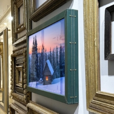 50" Landscape Mirror TV- Leather (Edelman - Pine) Green leather frame with Gold Stitching Mirror and TV 50" diagonal behind the Mirror