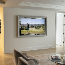 75" "Swoop" Landscape Plus - Leather with integrated soundbar rounded corner leather mirror television in a living room