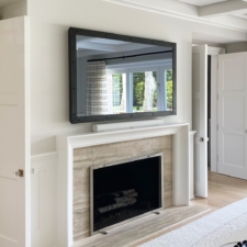 75" Landscape - Metal Raw Steel with Bolts Hidden 75" TV behind a mirror with a Raw Metal Frame with bolts