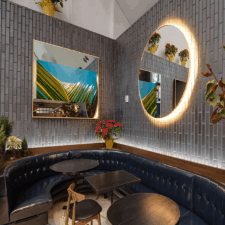 65" Square Plus - Metal for The Great American (TGA) Mirror TV in Restaurant bronze brass metal framed tv in square