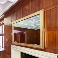 65" Landscape - Gilded Shaped w/ Gilded Sides gilded lemon gold edge to edge mirror tv over white mantel