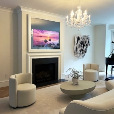 55" Landscape Plus - Specialty Wood White Satin Laquer White Square Shaped Frame with a TV inside of it over a white mantle place