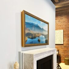 55" Landscape - Signature Carved 55" Mirror TV with gold frame over mantel fireplace