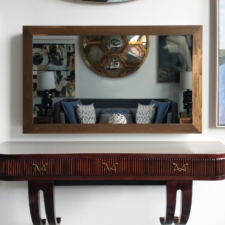 55" Landscape - Metal Bronze with Screws Mirror TV with metal zirconia bronze frame and screw details in nyc living room