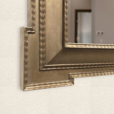 Gilded Carved - Dutch Style (GC209-A) Gilded carved light gold frame with triangled corner and raised curved detailing holding invisible television on white wall.