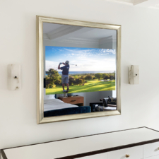 Square Mirrored TV over a bedroom dresser with white gold frame