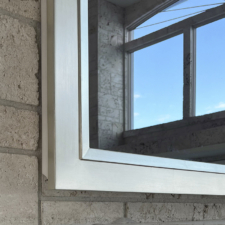 Gilded Shaped - GS23 White Gold frame for TV Mirror on stone wall
