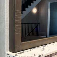 wood frame closeup with minimal carvings for mirror tv